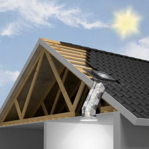 VELUX rigid sun tunnel installed on a black tiled roof, showcasing a cross-section of the reflective light tube directing sunlight into a home.